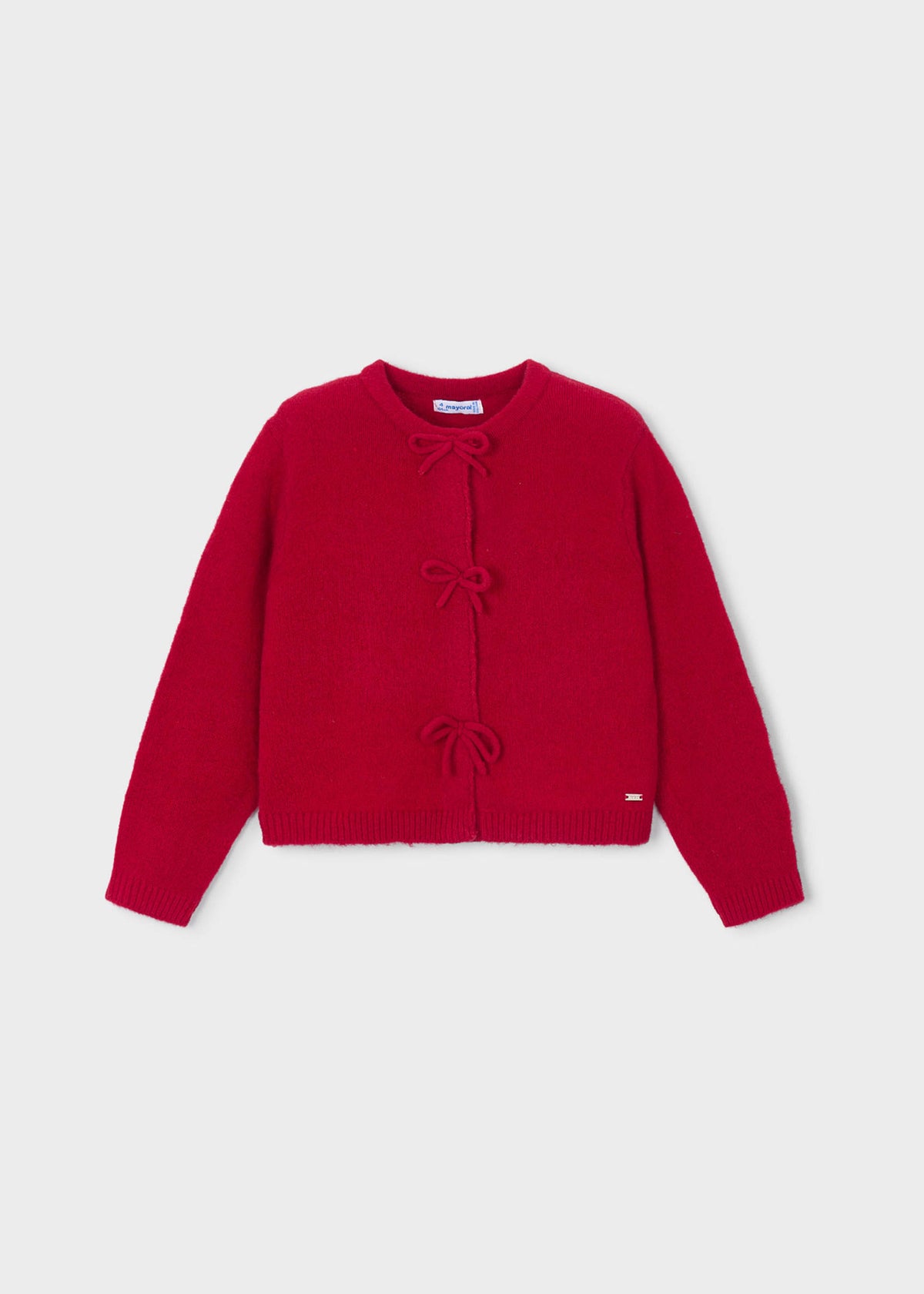 Gestrickte Mädchenstrickjacke mit Schleifen